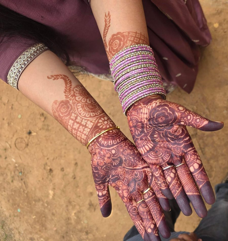 Bridal henna design on hands and arms